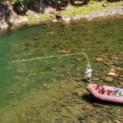 Raft-Fly-Fishing-For-Trout-in-clear-water-River
