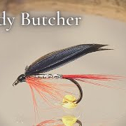 Tying-a-fly-called-Bloody-Butcher-Fly-Tying-tutorial-Ivars-Fly-Workshop